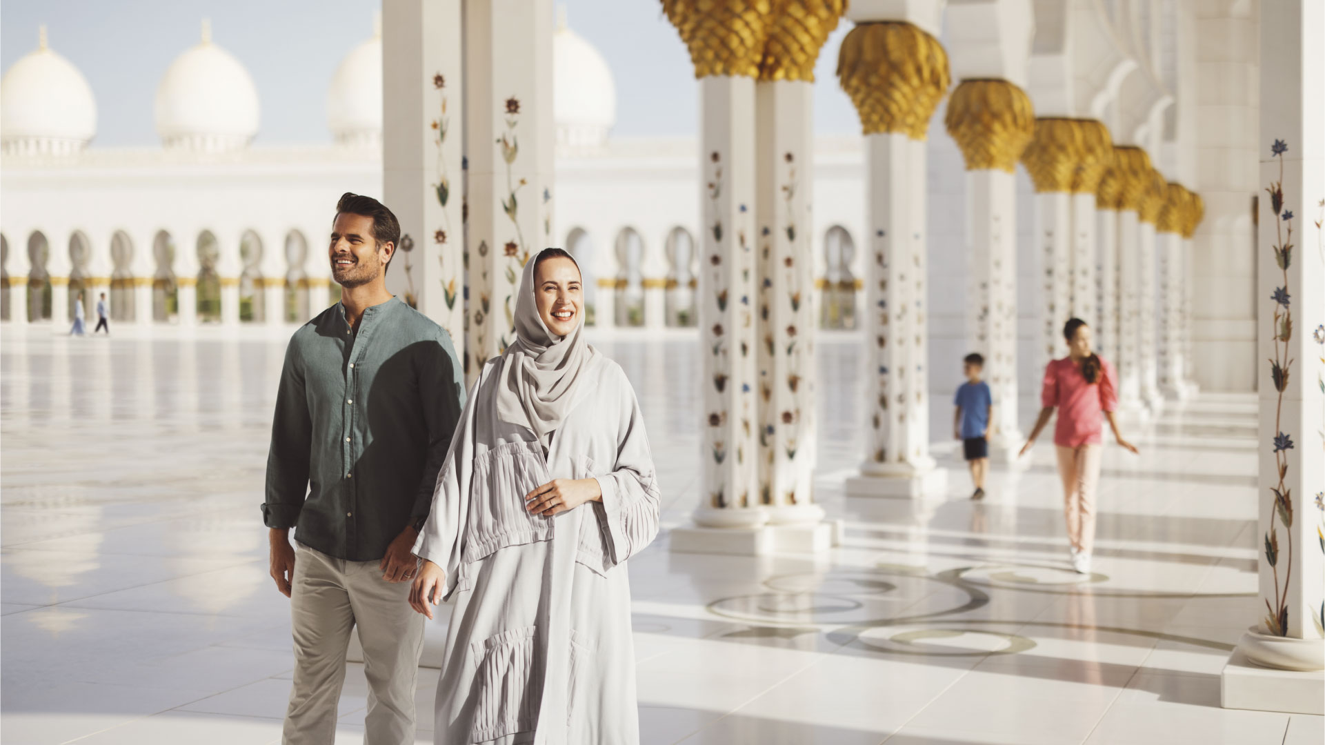 A couple in Sheikh Zayed Grand Mosque in Abu Dhabi
