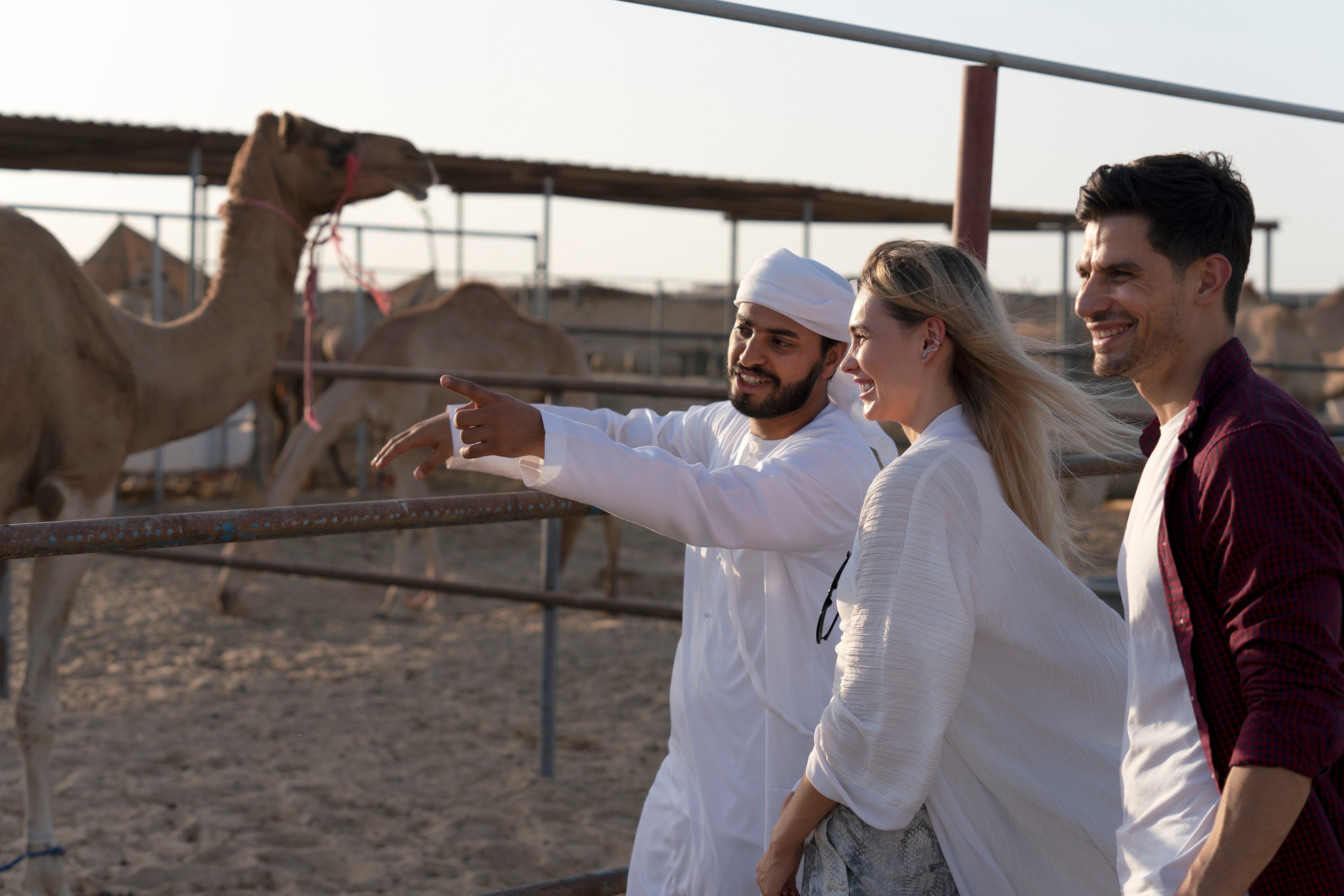 A couple visits to see a camel ranch
