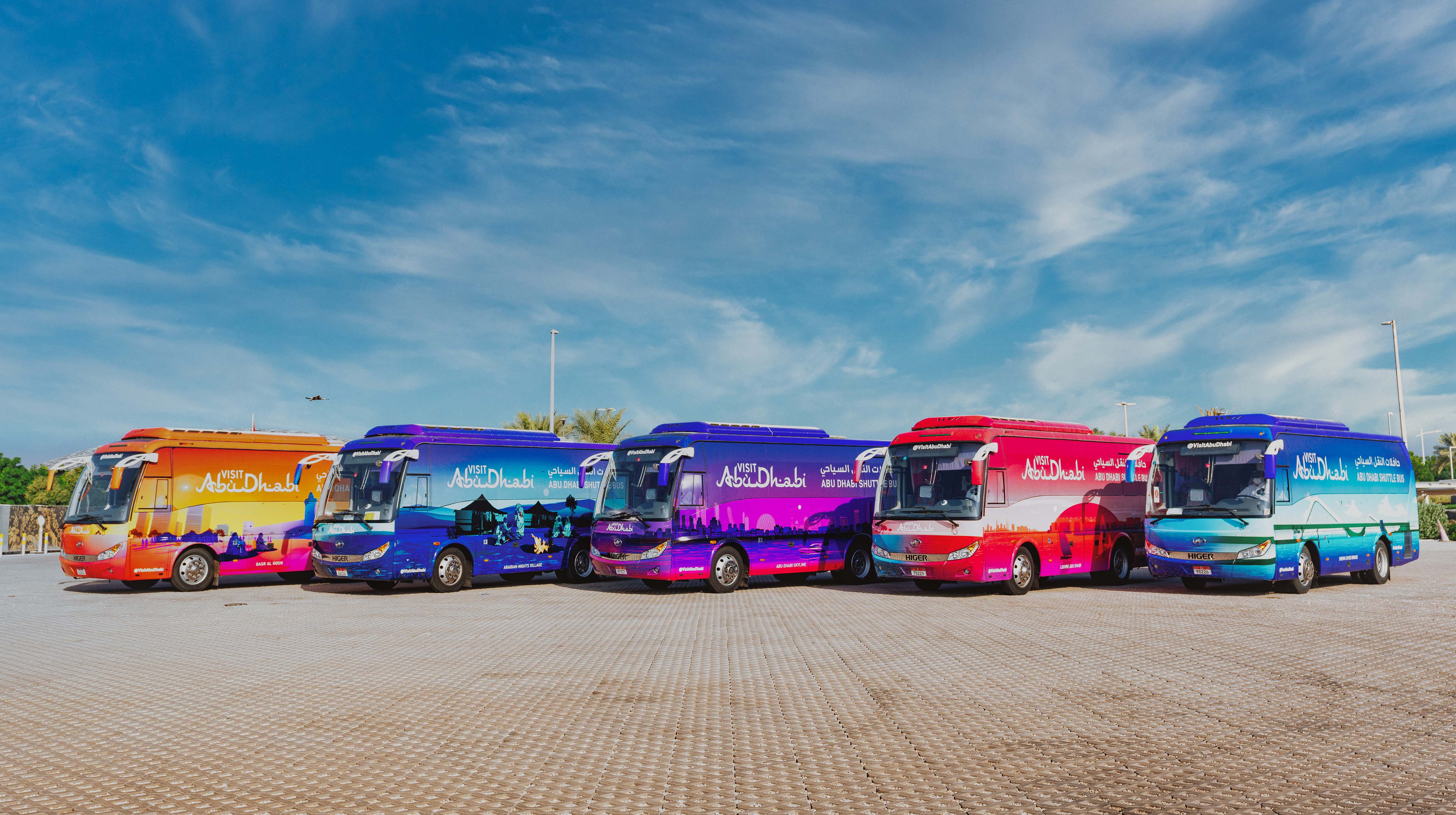 Five colourful Visit Abu Dhabi shuttle buses