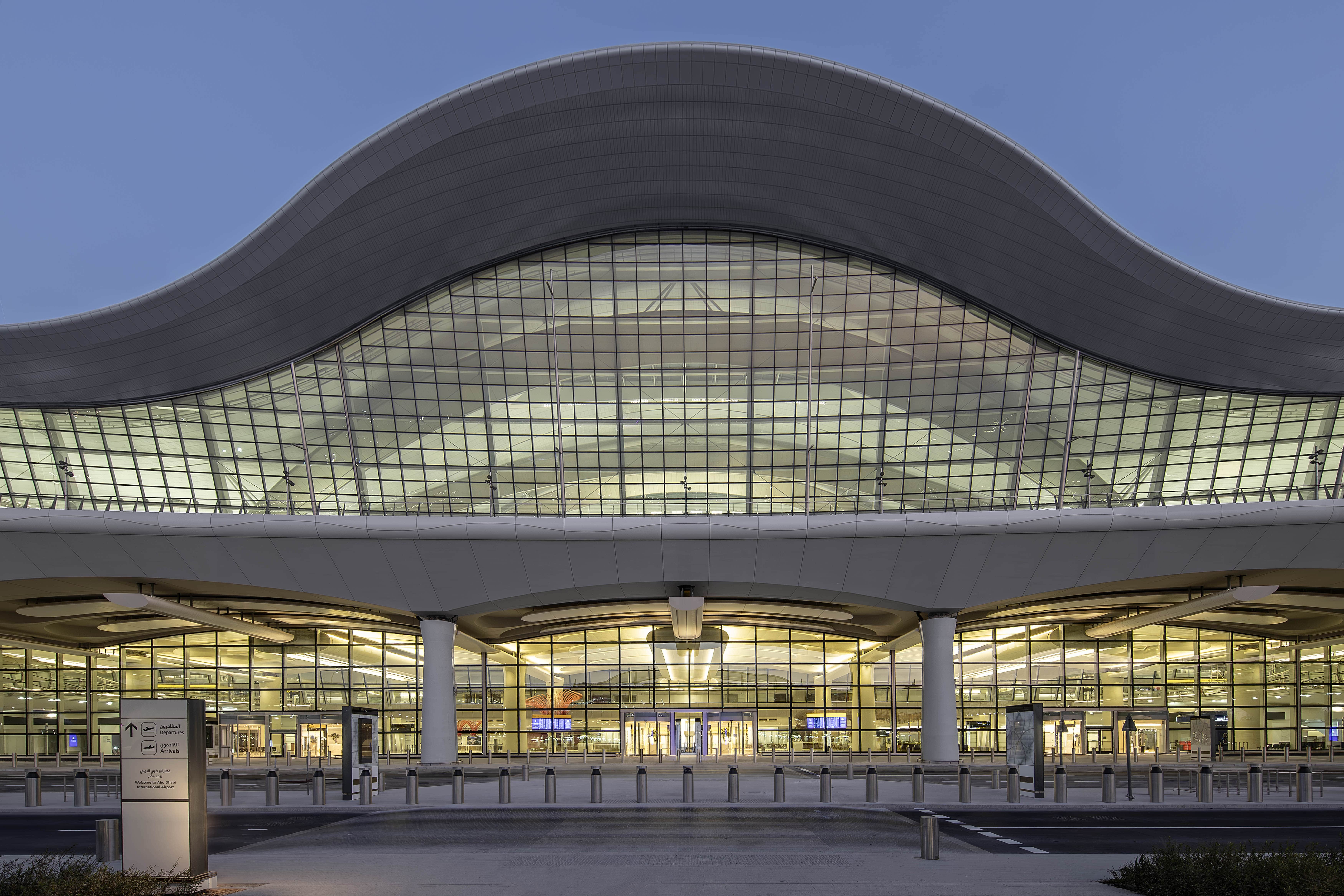 Front view of Zayed International Airport Terminal in Abu Dhabi, highlighting its modern design.