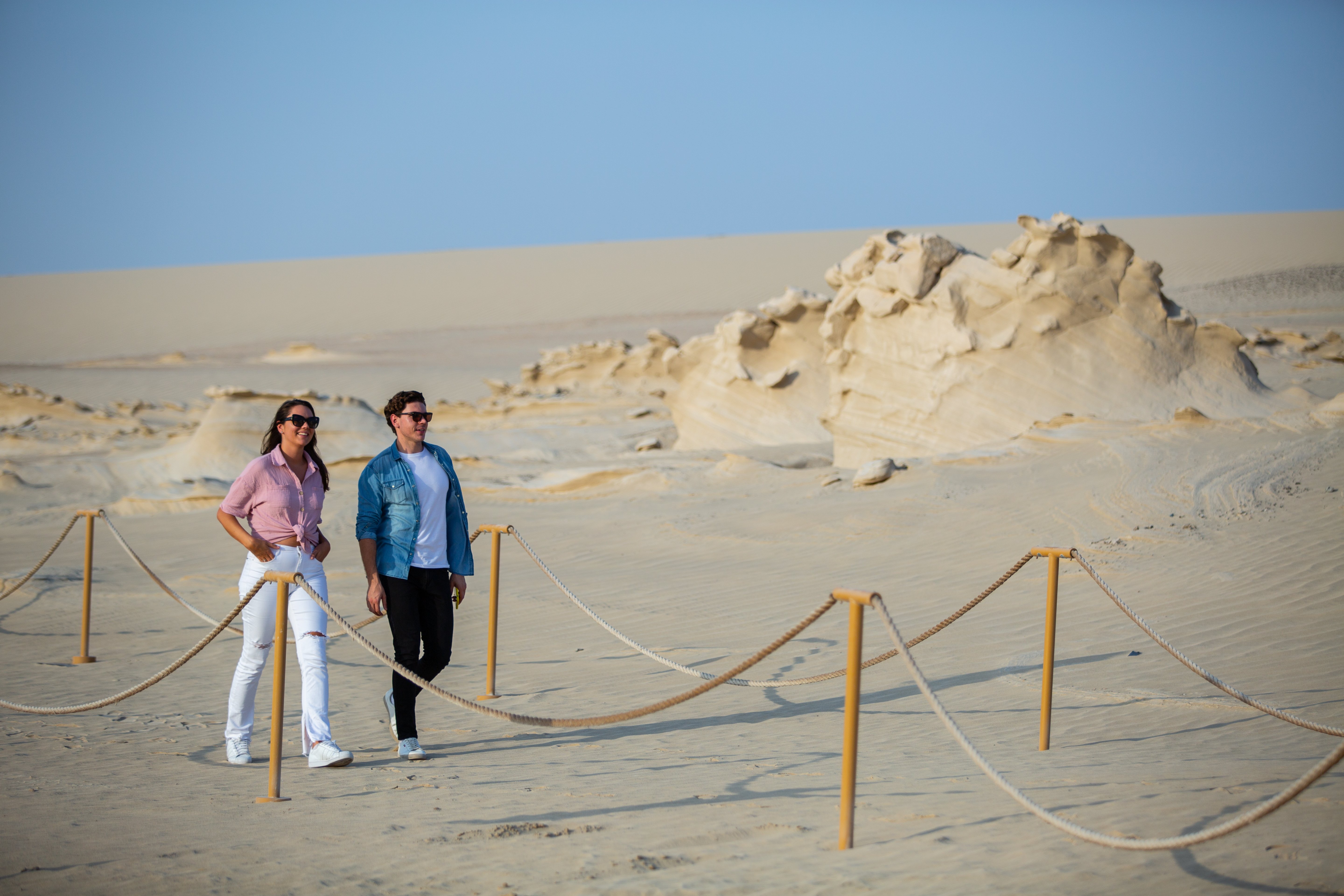 Western couple walking on the Al Wathba Fossils Protected Area Tour