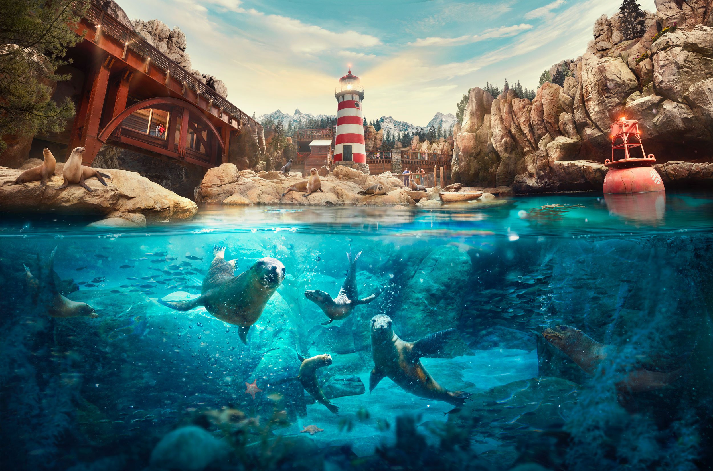 Foche nell’acqua al Seaworld Abu Dhabi. C'è un faro sullo sfondo.