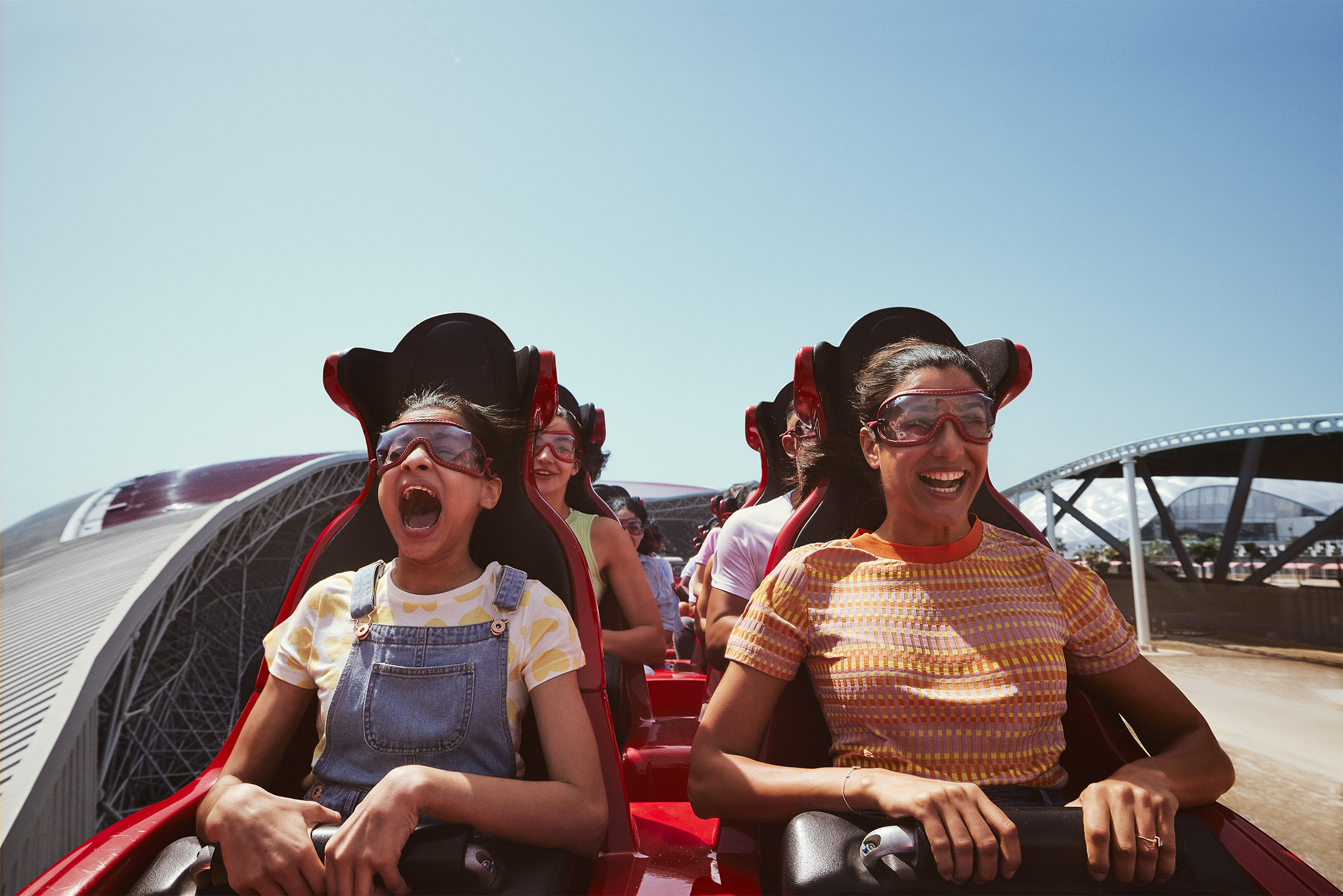 Woman and her daughter on a record-breaking rollercoaster on Yas Island