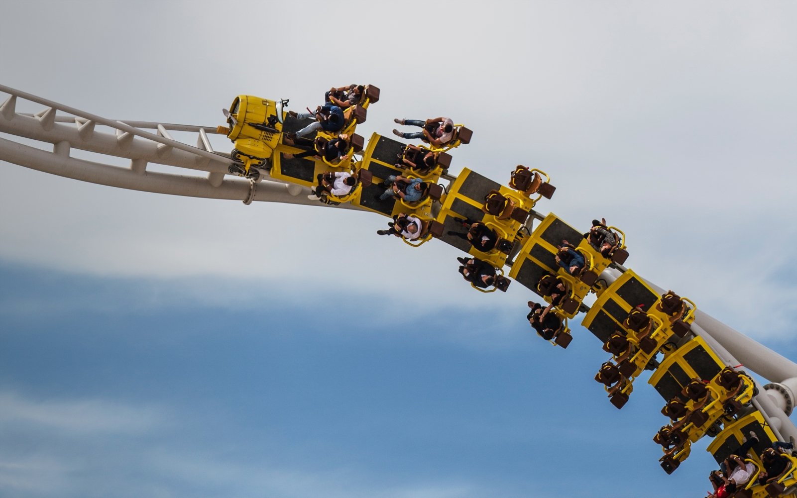 The upside-down loop of a yellow rollercoaster in Abu Dhabi